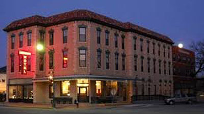 Photo of the Greenwood Hotel at night